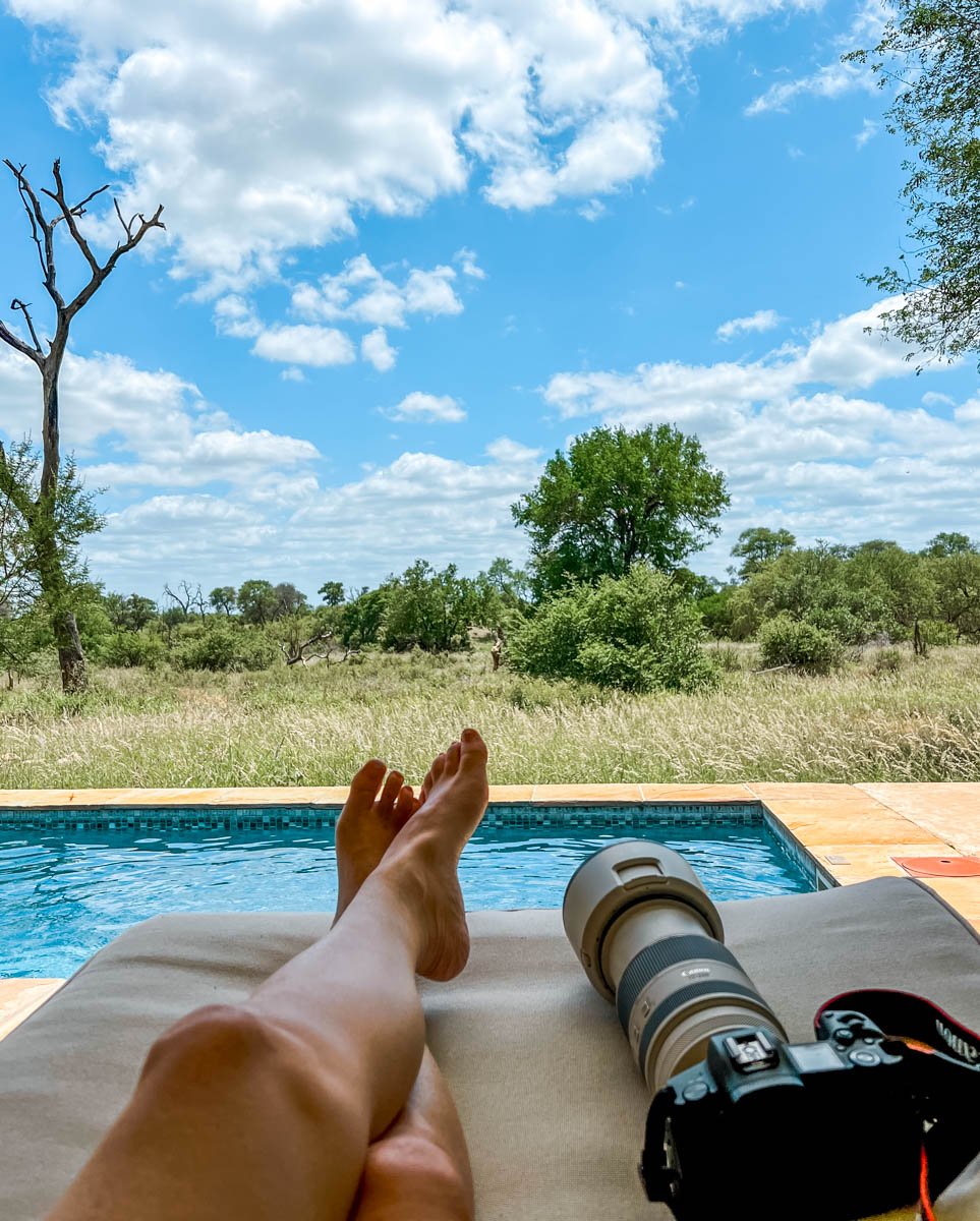 Pool day at the safari Lodge. Camera, Sam's legs, and the pool.